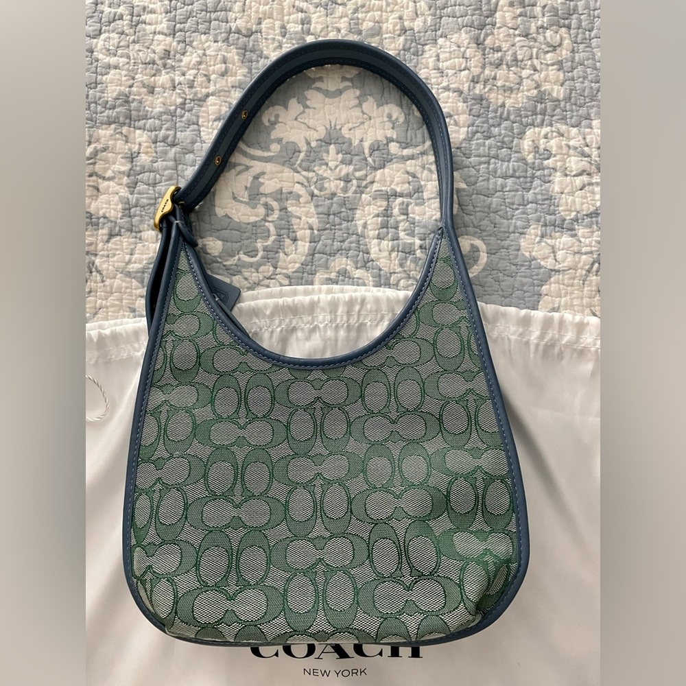 **SOLD**Coach Ergo. NWOT